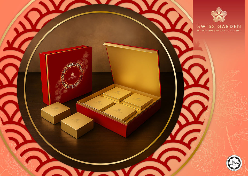 Decorative red and gold boxes with Swiss-Garden Hotel branding on a patterned background